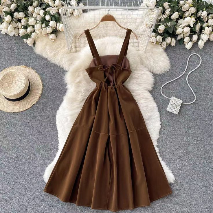 High-waist suspenders dress, cute, spaghetti strap dressMaterial:velvetColor:black,brownStyle:cuteFeatures:backlessSize:(cm):free 1inch=2.54cm,1cm=0.39 inchlength:110,bust:90,waist:80&ltp&gtNote:Due to different measurement methods,there will be 1-3 error(unite:cm), please understand.</p>&ltbr/>&ltp&gtPlease check the size carefully when you choose items,thank you.</p>&ltbr/> Dark Academia Fitted Dresses For Spring, Fitted Dark Academia Dresses For Spring, Fitted Spring Dress In Dark Academia Style, Chic Brown Dress With Buttons, Brown Solid Color Mini Dress, Brown Solid Winter Dress, Brown Solid Color Winter Dress, Chic Brown Midi Dress With Buttons, Brown A-line Dress With Buttons