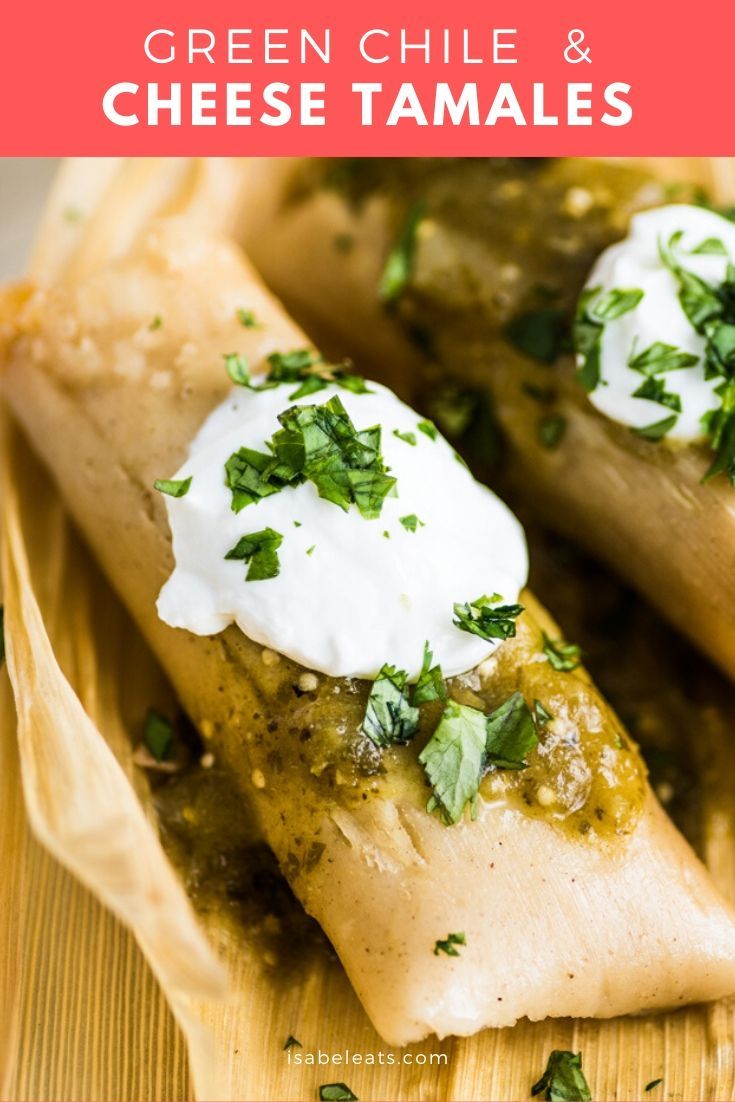 green chile and cheese tamales with sour cream on top