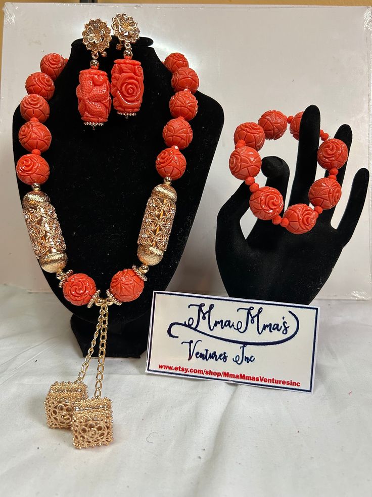 African coral beads, original long  coral beads for women. Nigerian bridal accessories,  coral beads. Yoruba/Igbo/ibo/Edo/Benin wedding. Coral beads.  3 piece includes 1 necklace, 1  bracelets and a pair of earrings  Materials: Coral gemstone  Mostly used - Traditional Wedding/marriage, Engagement, Baby Dedication, formal events. Kindly allow a difference of the picture/pattern of your item(s) between the real-life image and the photographic image on the website. No refund/no return /no exchange Spiritual Beaded Celebration Jewelry, Hand-strung Beaded Necklaces With Round Beads For Party, Spiritual Jewelry With Polished Beads For Parties, Hand-strung Beaded Necklaces For Party With Round Beads, Spiritual Polished Beads Jewelry For Party, Hand-strung Beaded Necklace For Party With Round Beads, Spiritual Polished Bead Jewelry For Parties, Traditional Beaded Bracelets For Celebration, Bohemian Large Beads For Wedding