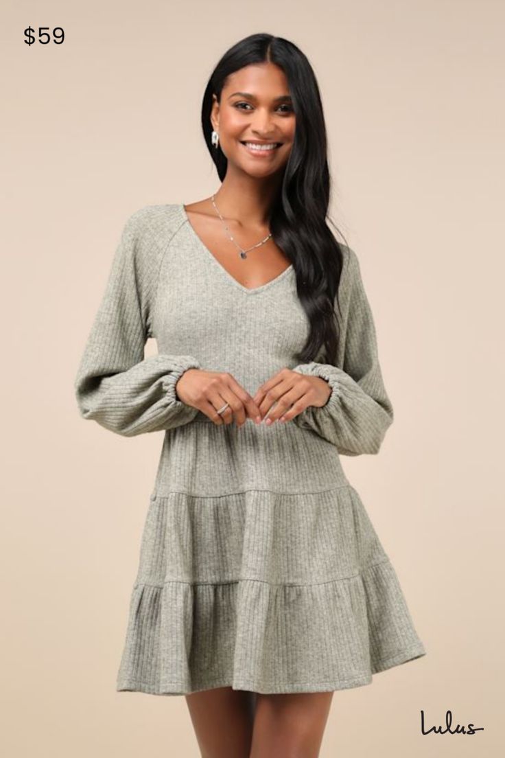 There's no better pick than the Lulus Adorable Option Heather Green Long Sleeve Mini Sweater Dress to be your new favorite fall addition! This darling sweater dress is composed of stretchy ribbed knit (with a subtle heathered effect throughout) that shapes a darted bodice, a V-neckline, and long balloon sleeves with elastic at the cuffs. The fitted, banded waist tops a tiered, skater-style skirt that finishes at a mini hem. Fit: This garment fits true to size. Length: Mid-thigh. Size medium meas Casual Knit Mini Dress For Fall, Knit Long Sleeve Mini Dress For Fall, Knit Mini Dress For Fall Day Out, Ribbed Dresses For Fall Day Out, Ribbed Dresses For Day Out In Fall, Ribbed Loungewear Dresses For Fall, Fall Ribbed Loungewear Dresses, Fall Day Out Ribbed Dresses, Casual Fall Dresses For Loungewear