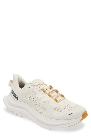 This all-purpose training shoe is updated with a single-layer mesh upper, a sock-like bootie and ghillie lacing to deliver a secure, well-balanced ride. The speckled regrind midsole and gum-rubber outsole are designed for lateral side-to-side movement so you easily transition from street to studio floors. Neutral: provides soft, even cushioning with an emphasis on comfort during any activity Lace-up style Removable insole Textile and synthetic upper/synthetic lining and sole Imported Cream Mesh Sporty Running Shoes, Sporty Cream Mesh Running Shoes, Cream Running Shoes With Laces For Light Sports, Cream Running Shoes For Light Sports, Beige Running Shoes With Vibram Sole, Functional Beige Running Shoes With Rubber Sole, Beige Mesh Running Shoes For Sports, Breathable Beige Lace-up Running Shoes, Beige Breathable Lace-up Running Shoes