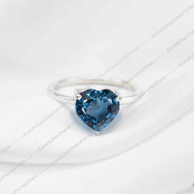 Mom London Blue Topaz Ring, London Topaz Ring, Engagement Gift Ring, Gemstone Ring, 925 Sterling Silver, Women London Blue Topaz Ring Mom , Her, Valentine Day Gift Her Matel : - 925 sterling silver / gold fill Gemstone :- London Blue Topaz shape : Faceted Heart color : London Blue Stone Size: 9mm. ring size : all size rings available OCCASION: BIRTHDAY GIFT, WEDDING ANNIVERSARY, PARTY WEAR, MARRIAGES, CASUAL, DAILY WEAR, Ideal For Gifting kandukeshwarcreations Don't miss the rest of the collection, click the link below! https://www.etsy.com/shop/kandukeshwarcreation?ref=seller-platform-mcnav More items Blue Topaz please click the link. https://www.etsy.com/shop/kandukeshwarcreation?ref=seller-platform-mcnav&search_query=blue+topaz #Silver plated Ring #Handmade Ring #Unisex Ring #German Sil Heart Cut Blue Topaz Rings For Anniversary, Heart Cut Blue Topaz Promise Ring, Heart Cut Topaz Gemstone Ring For Promise, Heart Cut Blue Topaz Ring As A Gift, Heart Cut Topaz Ring For Promise, Heart Cut Blue Topaz Ring For Gift, Heart Cut Topaz Promise Ring, Gift Heart Cut Blue Topaz Rings, Sterling Silver Sapphire Heart Cut Promise Ring