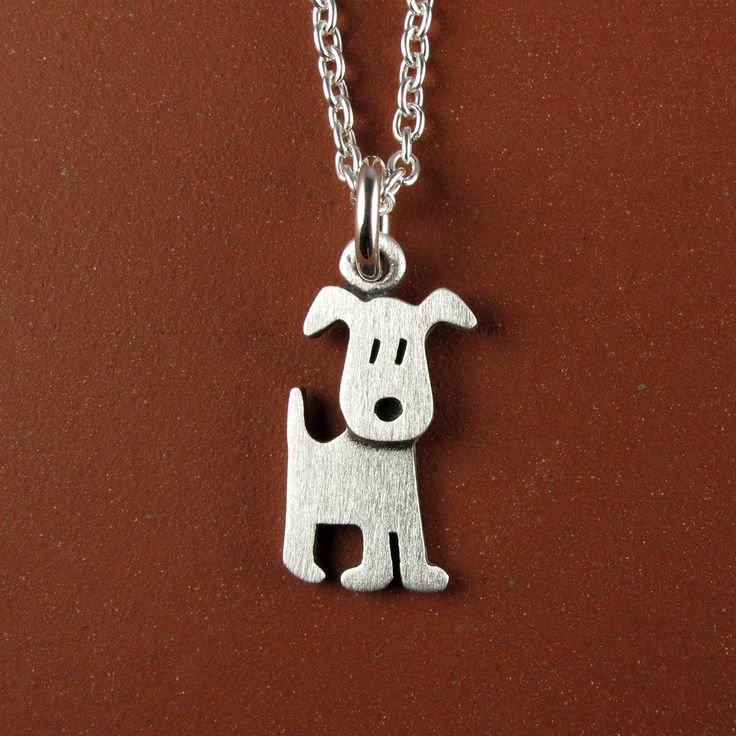 "This adorable little puppy is made of sterling silver.  The pendant is TINY, measuring about 1/2\" tall (1.3 cm).  So cute! You can purchase just the pendant/charm, or complete the necklace with a sterling silver chain.  Matching earrings:  www.etsy.com/listing/617260650/tiny-puppy-earrings © Stick Man Creations This is our own original design, handcrafted by us, and signed on the back with our logo.   For more information about the creative process, click here:  www.etsy.com/shop/StickManJewel Cute Silver Sterling Silver Charm Necklaces, Cute Nickel-free Sterling Silver Necklaces, Cute Sterling Silver Pendant Charm Necklaces, Cute Sterling Silver Pendant Charm Necklace, Cute Hypoallergenic Silver Charm Necklaces, Cute Nickel-free Silver Charm Necklace, Cute Silver Nickel-free Charm Necklaces, Cute Silver Nickel-free Charm Necklace, Small Sterling Silver Charm Necklace