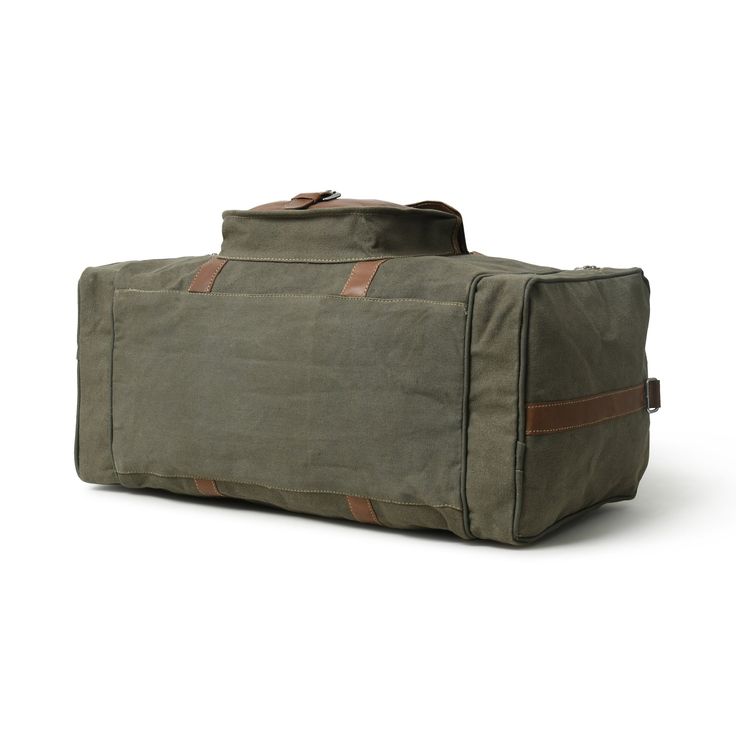 Trustpilot﻿ Our Arnold canvas duffle bag is specially made for your weekend trips where you need a bag to carry your travel essentials in a comfortable and stylish manner. This bag is Handcrafted with the finest quality Canvas and full grain leather, robust stitching, nickel hardware, and high-quality zippers to ensure perfection and durability. The tough brown leather handles and shoulder strap allows you to carry it very comfortably. A stylish duffel bag that is lightweight and heavy-duty to e Functional Canvas Duffle Bag With Luggage Sleeve, Casual Travel Bag With Leather Trim For Overnight Trips, Cotton Bag With Luggage Sleeve For Overnight Trips, Rectangular Canvas Weekender Bag With Canvas Lining, Cotton Bags With Luggage Sleeve For Overnight Trips, Classic Canvas Weekender Bag For Overnight Trips, Cotton Duffle Bag With Luggage Sleeve For Overnight Trips, Waxed Cotton Canvas Bag For Travel, Cotton Duffle Bag With Large Capacity For Overnight Trips