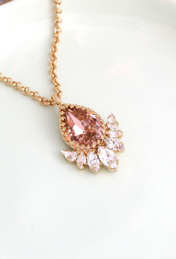 "Blush Necklace, Morganite Necklace, Bridal Necklace, Rose Gold Necklace, Blush Crystal Necklace, Bridesmaids Swarovski Crystal Necklaces Matching jewelry : http://etsy.me/2FOtx9O Petite Delights is an Official SWAROVSKI® Branding Partner Our brand is legally licensed & authorized By Swarovski Company for high quality manufacturing. Details : ♥ Materials- Gold Plated Over Brass, The necklace is 14 k Gold Filled CRYSTALLIZED™ Swarovski Element. ♥ Choose your style of plating at checkout ♥ U.S Blush Necklace, Morganite Necklace, Necklace Rose Gold, Earring Trends, Necklace Bridal, Crystal Necklaces, Swarovski Crystal Necklace, Necklace Rose, Matching Jewelry