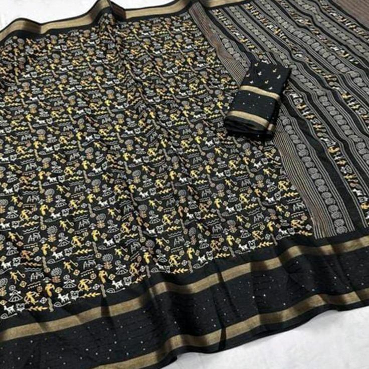 Black colored saree is made from Georgette fabric which is highlighted with beautiful warli print work as shown. Comes along with unstitched banglori silk blouse piece which you can customise as per your design/style. Occasion - You can wear this saree for Casual and functuons. Note:- the actual product may differ slightly in color and design from the one illustrated in the images when compared with computer or mobile screen. Measurements: Saree : Georgette : 5.5 Mtrs Blouse : Georgette : 0.8 Mt Navratri Black Cotton Silk Traditional Wear, Black Cotton Silk Traditional Wear For Navratri, Black Cotton Silk Saree Blouse Piece, Black Chanderi Saree For Navratri, Navratri Black Cotton Silk Saree, Black Cotton Silk Saree For Navratri, Black Tussar Silk Dupatta For Navratri, Bollywood Style Black Handloom Dupatta, Black Handloom Tussar Silk Blouse Piece