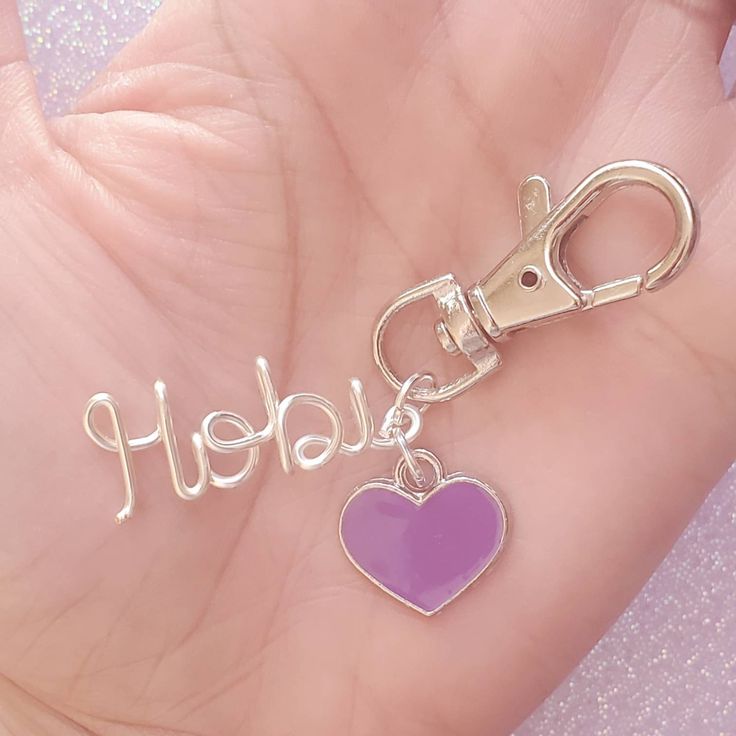 Do you love Hobi? This is the best bag charm or keychain for every BTS fan! Available in Stunning Silver with this beautiful purple heart! We bet you can't wait to get this and show all of your BTS-lover friends! We use NON-TARNISH silver plated copper wire - 16 gauge. Beautifully made and very sturdy. Made and shipped from the USA. Trendy Custom Name Jewelry For Everyday, Trendy Custom Name Jewelry For Everyday Wear, Trendy Purple Jewelry For Gift, Trendy Custom Name Silver Jewelry, Trendy Silver Jewelry For Best Friend Gift, Trendy Silver Jewelry With Custom Name, Trendy Charms Jewelry For Best Friend Gift, Trendy Personalized Silver Jewelry, Pink Kpop Jewelry For Gift