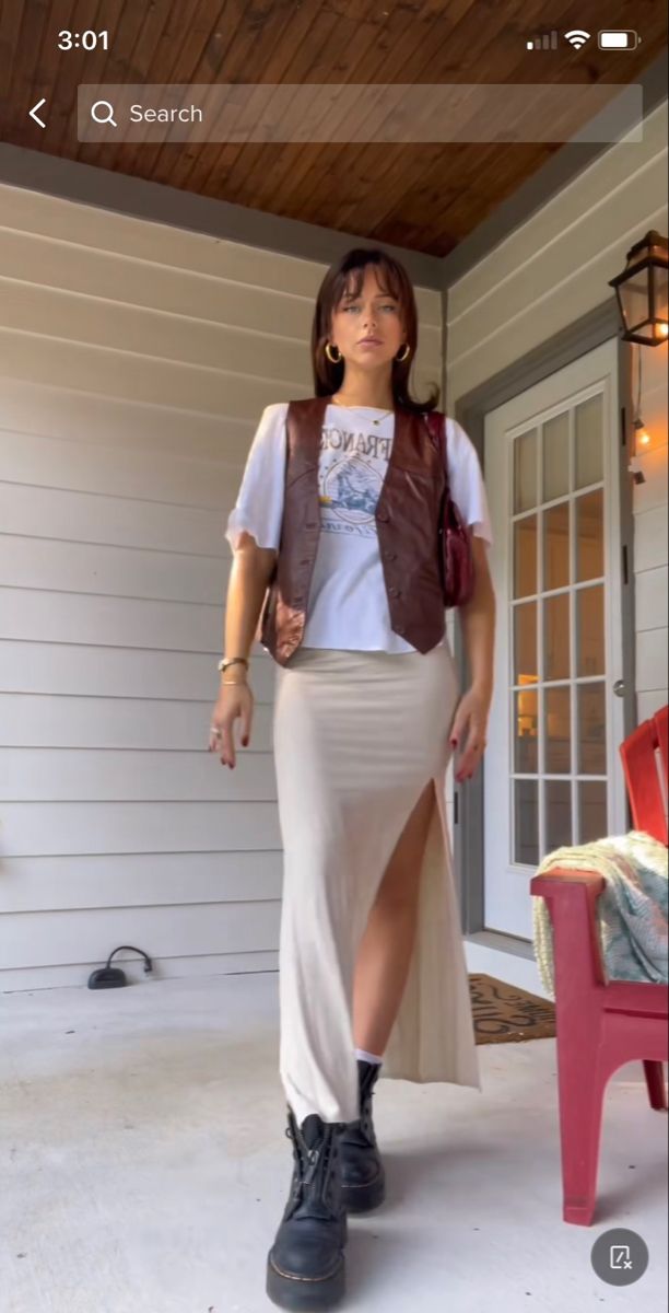 Womens Cream Dress, Women’s Leather Vest Outfit, Leather Vest With Dress, White Leather Vest Outfit, Leather Vest Outfits For Women Fall, Vest Midi Skirt Outfit, Preppy Street Style Summer, Tan Leather Vest Outfit, Hippy Going Out Outfits