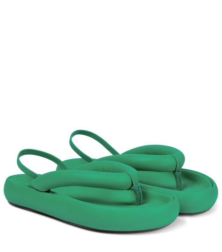 The Orene sandals are Isabel Marant riff on the poolside essential. Made from cushioning lambskin leather with padded straps, these slides sit on slightly elevated platforms and are kept in place with slingbacks. | Isabel Marant Orene leather thong sandals Bazar Ideas, Girls Shoes Teenage, Simple Sneakers, Thrift Board, Designer Flip Flops, Leather Trend, Fashion Shoes Boots, Green Sandals, Summer 2025