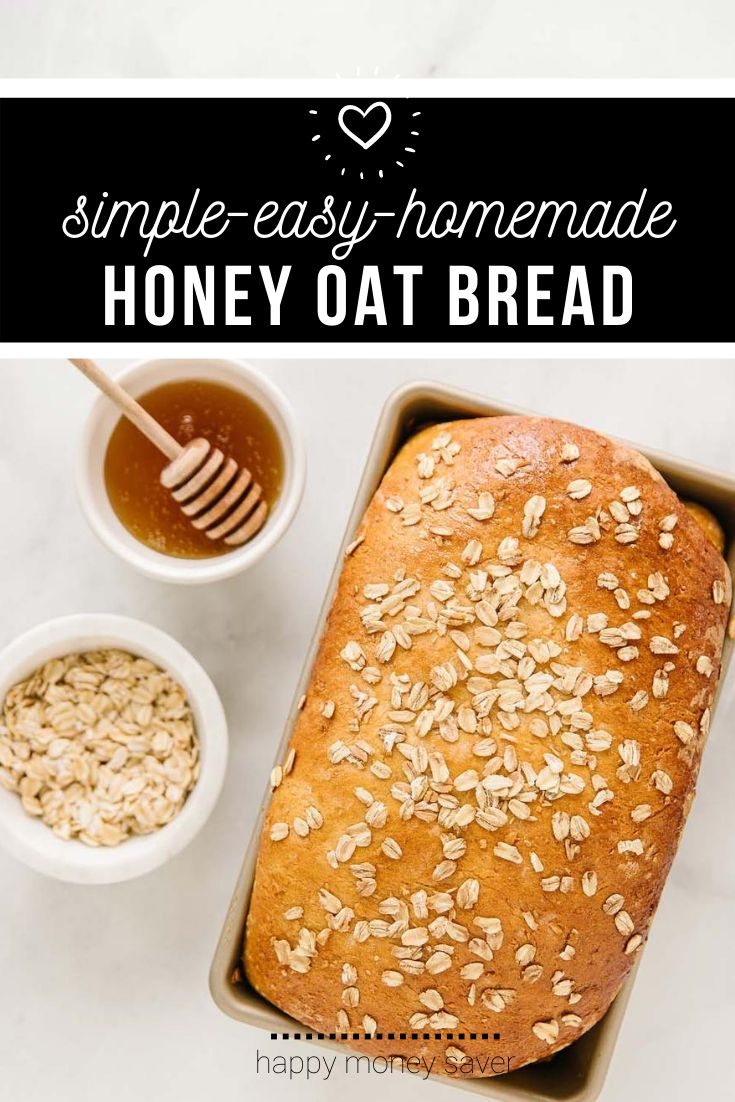 a loaf of oatmeal bread in a pan next to two small bowls of honey oats