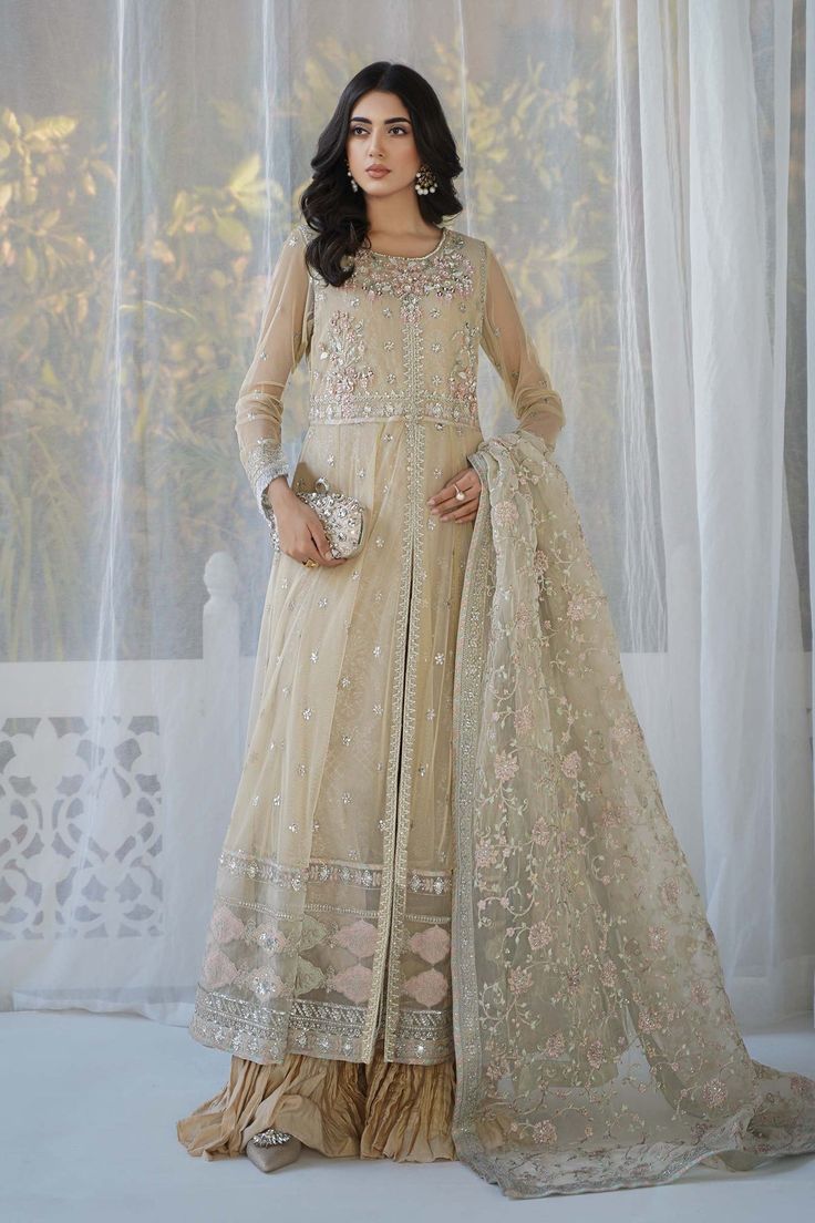 Maria B Skin Shade Embroidered Pakistani Party Wear Frock Dress Sequin Gown For Eid Reception, Bollywood Designer Dresses With Sequins, Designer Festive Dress With Sequins, Festive Designer Dresses With Sequins, Embellished Embroidered Dress For Eid Designer Wear, Beige Embellished Party Sets, Embellished Anarkali Dress For Eid, Eid Embellished Designer Dress, Embellished Dress For Eid Designer Wear