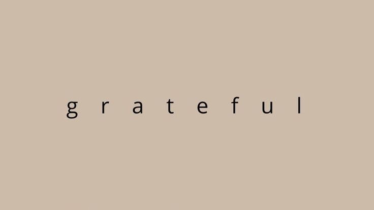 the word grateful written in black on a beige background