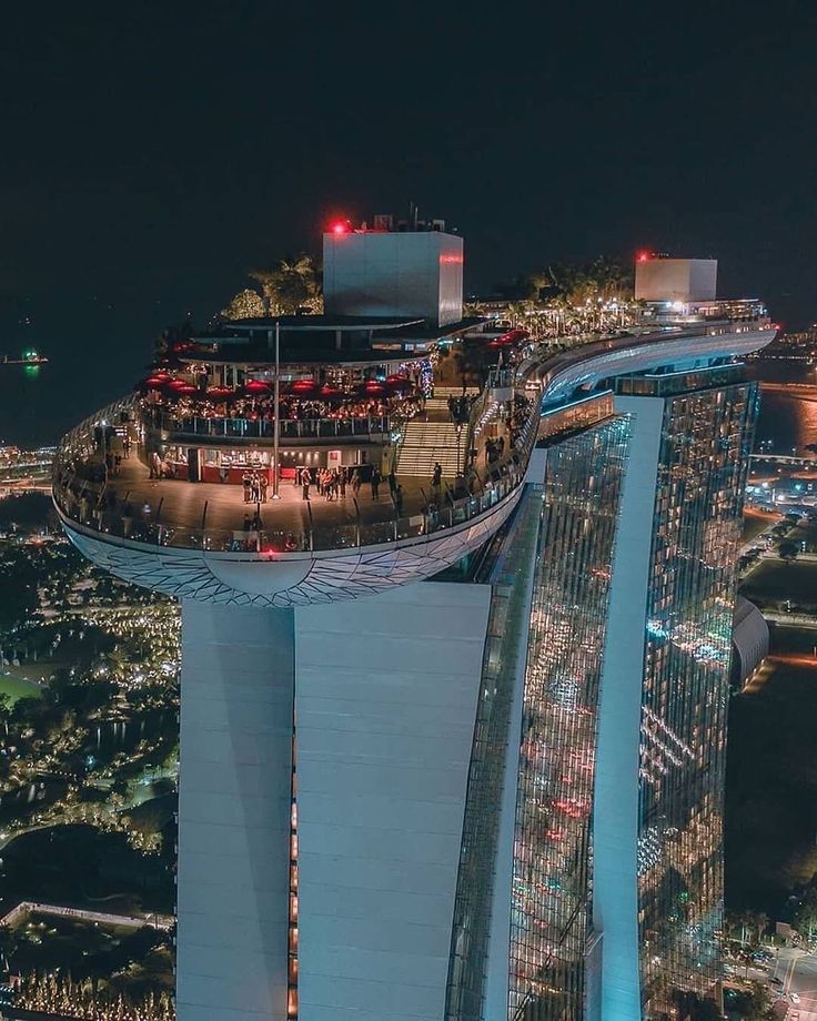 an aerial view of a city at night