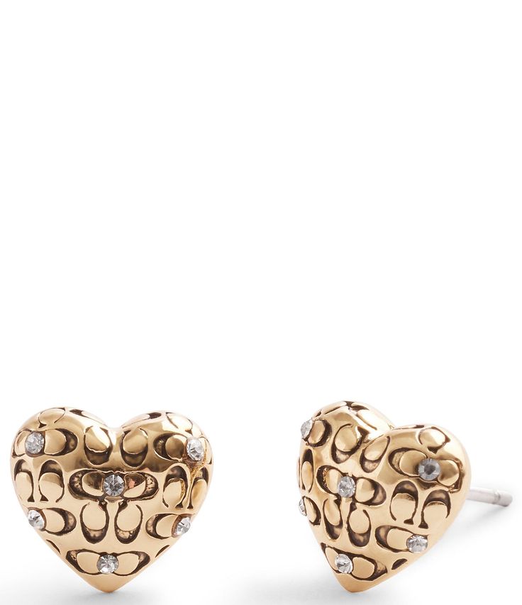 From COACH&#x2C; these earrings feature:Heart Stud Earrings Brass/Glass crystal/TitaniumApprox. 0.4 L x 0.4 WClosure Post backQuilted signature sculpted C motif and delicate crystal stone accentsHypoallergenic titanium postsIncludes signature COACH jewelry pouchImported. Coach Gold Heart-shaped Jewelry, Coach Heart-shaped Gold Jewelry, Coach Elegant Heart-shaped Jewelry, Coach Elegant Heart Jewelry, Elegant Coach Heart-shaped Jewelry, Elegant Coach Heart Shaped Jewelry, Coach Earrings, Dope Jewelry Accessories, Coach Jewelry