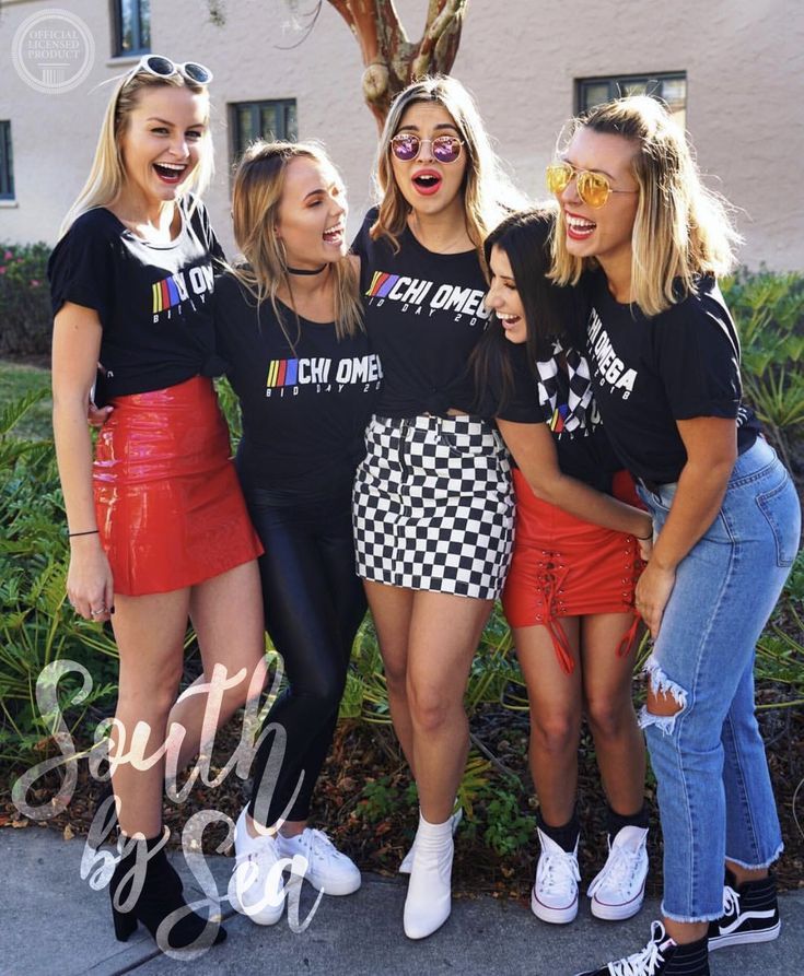 four girls are posing for the camera with their arms around each other while wearing matching outfits