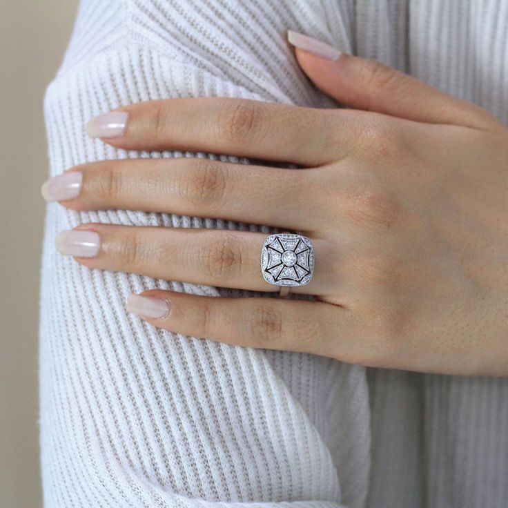 💍💎 Go watch a video of this ring: (Please copy and paste the address below into the web address bar!) https://www.youtube.com/watch?v=51f06EC2AEA Matching Necklace: https://www.etsy.com/listing/270127072/milgrain-art-deco-pendant-necklace?ref=shop_home_active_7&frs=1 Our diamond simulants are elegant, unique, and outstanding. The gemstones are cultured from the Czech Republic and handmade at our studios in Garment District and Diamond District in New York City, U.S. They are finished throu Formal White Cluster Ring With Halo Design, White Diamond Ring With Rose Cut, White Diamond Ring With Halo Design For Anniversary, White Cluster Ring With Halo Design In Cubic Zirconia, White Cubic Zirconia Cluster Ring With Halo Design, White Round Cluster Ring With Brilliant Cut, White Brilliant Cut Cluster Ring, White Brilliant Cut Round Cluster Ring, Formal White Halo Design Wedding Ring