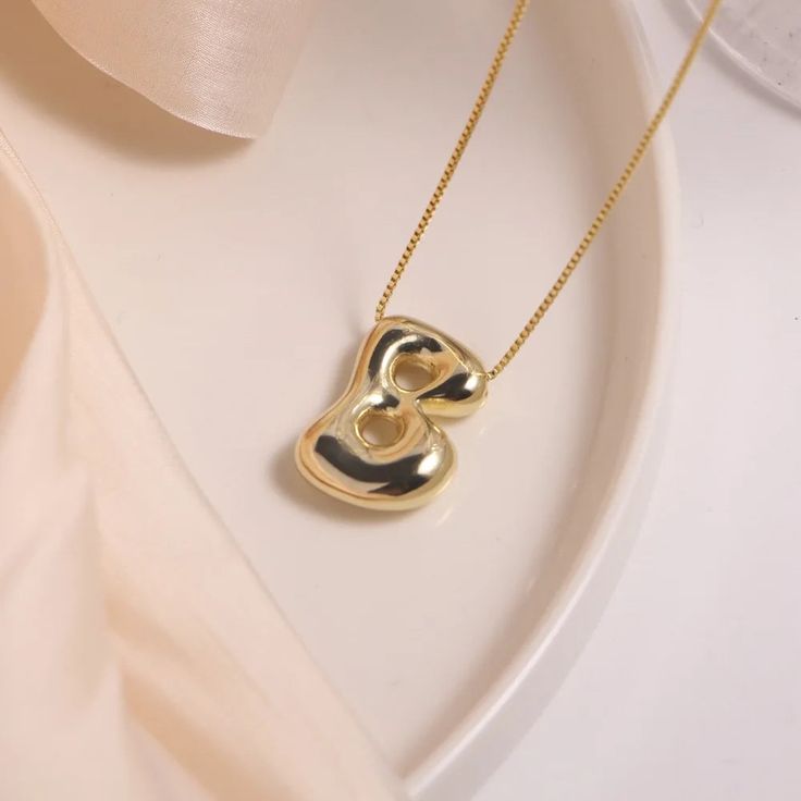 44412896673977 Gold Trendy Initial Necklace, Trendy Gold Initial Necklace, Modern Gold Name Necklace, Modern Gold Necklace With Initials, Modern Gold Initial Pendant Necklace, Trendy Initial Pendant Necklace With Clavicle Chain, Trendy Initial Pendant Necklaces, Trendy Initial Pendant Charm Necklace, Trendy Gold Initial Pendant Name Necklace