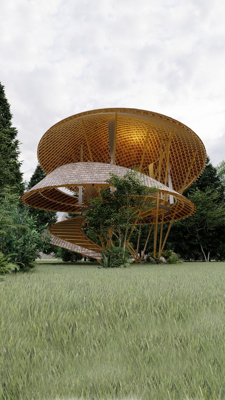 an artistically designed building in the middle of a field with tall grass and trees