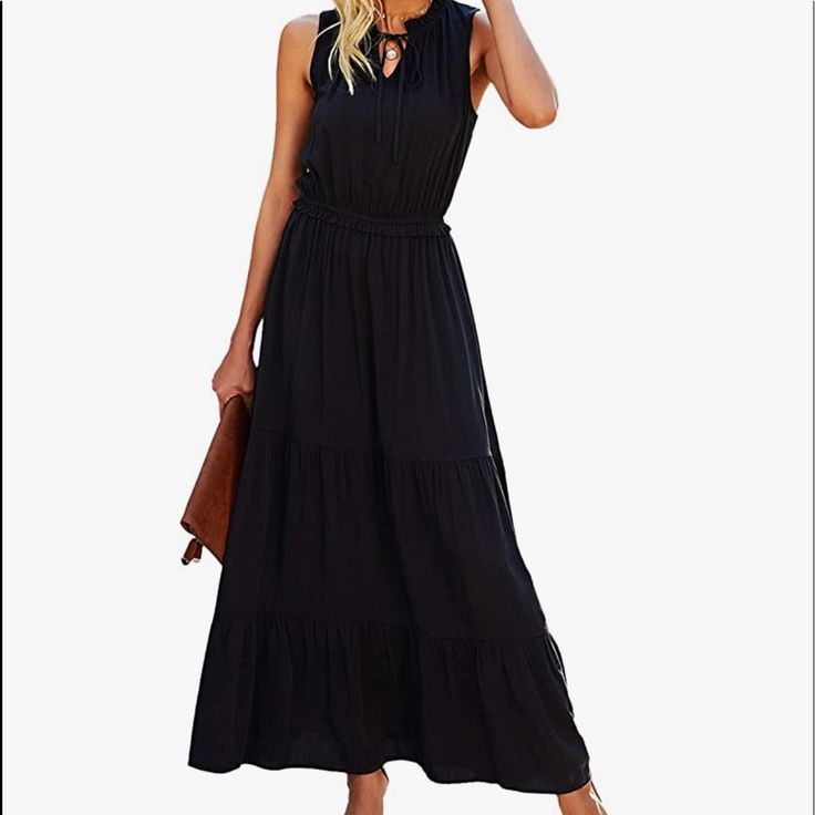 Kirundo 2021 Summer Women’s Sleeveless Maxi Dress Solid Color Round Neck Tie Neck Dress High Waist Ruffle Hem A-Line Dress. Completely Sold Out At Amazon. Black Sleeveless Midi Dress For Vacation, Black Sleeveless Midi Dress For Summer, Black Midi Sleeveless Summer Dress, Black Midi Length Sleeveless Summer Dress, Black Casual Maxi Sundress, Chic Black Sleeveless Sundress, Black Halter Neck Sleeveless Dress For Day Out, Black Sleeveless Midi Summer Dress, Casual Black Sleeveless Sundress