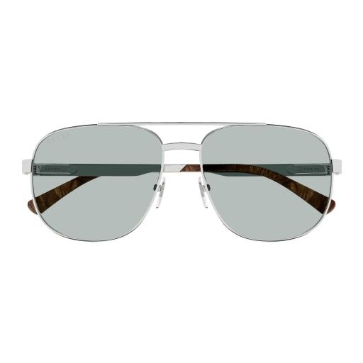 A 90s vintage twist characterizes this full metal caravan shape with web detail on the temples. The style comes with two skus with or without enamel which give to the style a strong brand recognizability. The style is characterized by exclusive Gucci patented Flex hinge. Classic Gucci Shield Sunglasses For Summer, Casual Gucci Aviator Sunglasses For Summer, Gucci Casual Aviator Sunglasses For Summer, Classic Aviator Sunglasses With Square Frame, Classic Glass Aviator Sunglasses For Summer, Classic Gucci Aviator Sunglasses For Summer, Classic Gucci Shield Sunglasses With Polarized Lenses, Classic Sunglasses With Metal Frame, Trendy Gucci Aviator Sunglasses For Summer