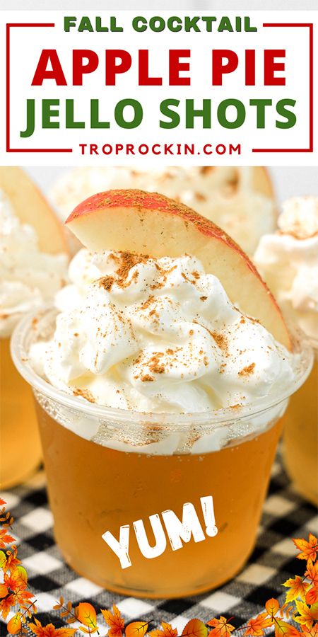 an apple pie jello shot in a cup with whipped cream and cinnamon on top