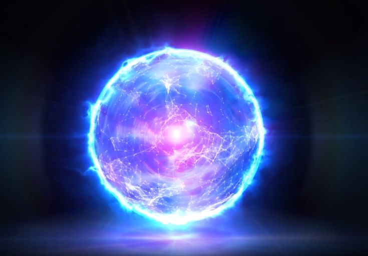 an image of a ball with blue and pink lights in the center on a black background