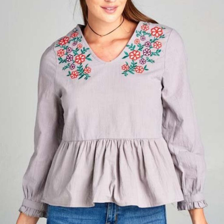 Lavender Floral Embroidered Blouse With Longsleeves, A Ruffled Hem Color: Lavender Material: 100% Cotton Fit: True To Size Casual Purple Blouse With Floral Embroidery, Purple Floral Embroidered Top For Fall, Purple Floral Embroidery Top For Fall, Casual Embroidered Purple Blouse, Casual Purple Embroidered Blouse, Spring Purple Embroidered Cotton Top, Spring Cotton Embroidered Sleeve Top, Spring Embroidered Long Sleeve Top With Ruffles, Lavender Long Sleeve Cotton Top