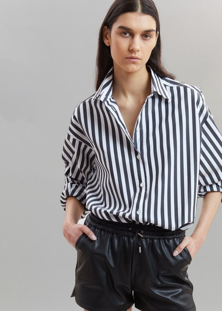 Sylvia Striped Oxford Shirt - Faded Black/White Shirt The Frankie Shop Classic Shirt With Roll-up Sleeves For Day Out, Oversized Blouse With Roll-up Sleeves And Spread Collar, Chic White Blouse With Roll-up Sleeves, Classic Shirt With Spread Collar For Day Out, Chic Shirt For Daywear With Relaxed Fit, Chic Relaxed Fit Shirt For Daywear, Chic Oversized Top With Spread Collar, Chic Shirt With Relaxed Fit And Spread Collar, Chic Relaxed Fit Shirt With Spread Collar