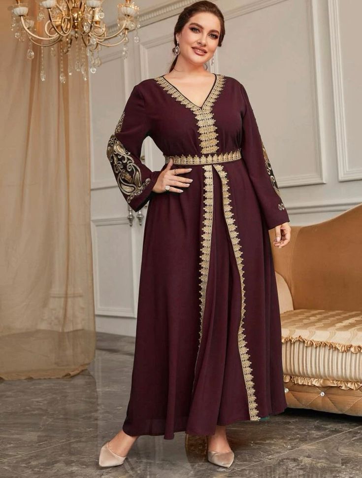 Experience the opulence and grace of our Elegant Maroon Embroidered Dress, intricately embellished with shimmering gold embroidery on the sleeves and front panel. The exquisite Guipure lace detailing adds a touch of sophistication, while the delicately embroidered waist and back tie exude elegance. Made from luxurious 100% polyester, it offers unrivaled comfort and style. Available in sizes 0XL - 4XL (US 12 - 20). **PLEASE NOTE**This item requires our "formal dresses" shipping option due to its Elegant Gold Dress With Resham Embroidery, Embroidered Long Sleeve Dress For Eid, Long Sleeve Embellished Embroidered Dress For Eid, Festive Long Sleeve Embellished Abaya, Long Sleeve Embroidered Dress For Eid, Traditional Long Sleeve Embellished Dresses, Elegant Gold Embroidered Dress For Eid, Embroidered Long Sleeve Abaya For Party, Elegant Long Sleeve Abaya With Intricate Embroidery