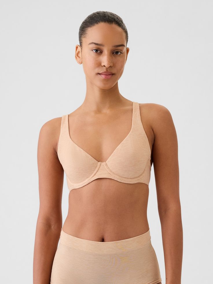 Ultra breathable, light as air spacer bra.  Unlined cups with underwire.  Convertible, adjustable straps unhook at back for cross-back option.  Adjustable hook and eye back closure.  This product was made in a factory that runs the Gap Inc.  P. A. C. E.  Personal Advancement & Career Enhancement) program.  P. A. C. E.  is our educational program that helps the women who make our clothes build the skills, knowledge, confidence & resilience needed to advance in work & life.  Learn more here.  Supp Everyday Solid Bra With Adjustable Straps, Everyday Fitted Bra With Medium Bust Support, Underwire Sports Bra With Padded Cups, Everyday Seamless Underwire Nursing Bra, Everyday Bra With Adjustable Straps, Supportive Medium Bust Support Bra For Summer, Fitted Bra With Removable Pads For Everyday, Summer Bra With Removable Pads And Medium Support, Supportive Summer Bra With Removable Pads