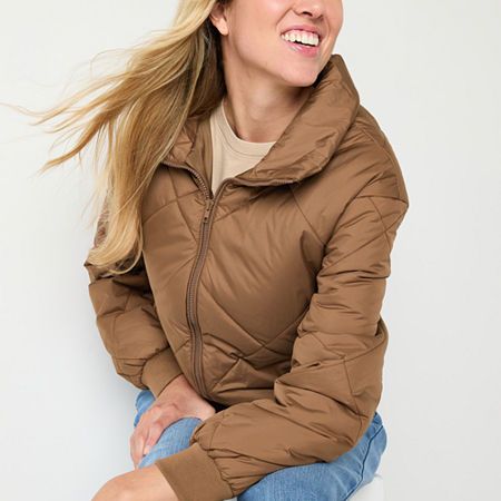 This a.n.a women's heavyweight puffer jacket is a chic yet cozy style to bundle up in when there's a chill. This quilted mid-length zip jacket has a collar neck and two pockets. Wear it over a fitted sweater with jeans. Closure Type: ZipperFit: Regular FitNeckline: Mock NeckPockets: 2 Side Zip PocketsSleeve Length: Long SleeveWarmth Factor: MidweightApparel Length: 26.5 InchesOuterwear Length: MidFiber Content: 100% PolyesterFabric Description: WovenFilling Content: 100% PolyesterLining Materia… Solid Color Spring Puffer Quilted Jacket, Trendy Hooded Quilted Jacket For Fall, Insulated Long Sleeve Quilted Jacket For Fall, Fall Insulated Long Sleeve Quilted Jacket, Solid Quilted Jacket For Outdoor Fall Use, Solid Quilted Jacket For Outdoor Fall Season, Solid Quilted Jacket For Outdoor Fall Activities, Solid Color Quilted Jacket For Outdoor Fall Use, Fitted Puffer Jacket For Outdoor Fall Use