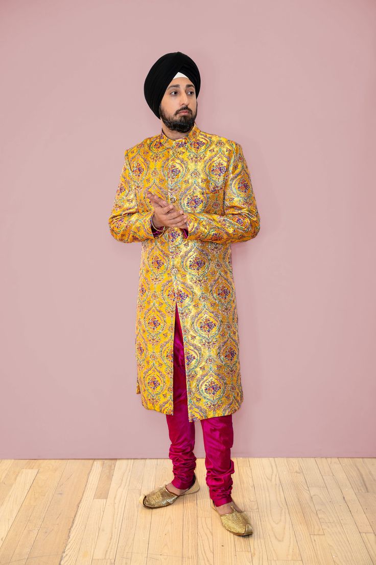 Aayan Yellow Mehendi Motif Jacquard Groom Sherwani - Harleen Kaur - Front View Gold Sherwani With Resham Embroidery And Kundan, Traditional Brocade Kurta With Gold Embroidery, Yellow Kurta For Navratri, Gold Sherwani With Zari Work In Kundan, Festive Sherwani With Gold Embroidery For Festivals, Yellow Kundan Kurta For Navratri, Gold Sherwani With Dupatta For Festive Occasions, Gold Sherwani With Dupatta For Navratri, Gold Kundan Kurta With Dabka Detailing