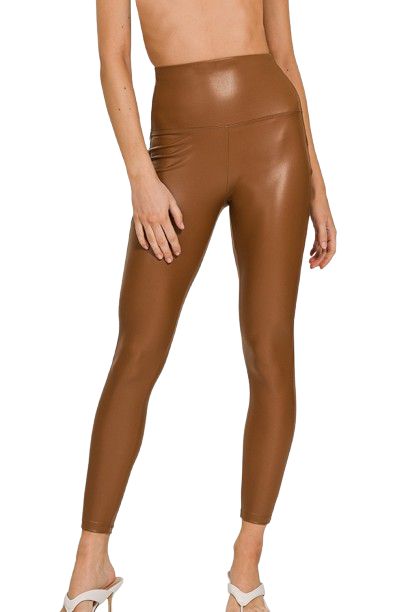 Step up your style game with our Camel Faux Leather Leggings, the perfect blend of fashion and comfort. Made from a 95% polyester and 5% spandex blend, these high-rise leggings provide just the right amount of stretch for a flattering and comfortable fit that moves with you. Whether you’re running errands or heading out for a night on the town, these leggings will be your go-to for effortlessly chic looks. Designed with an ankle-length cut and an inseam of approximately 26.75", they hug your cur Camel Leather Pants Outfit, Camel Leather Pants, Leather Pants Outfit Winter, Leather Legging, Stylish Leggings, Chic Coat, Ankle Length Leggings, Comfy Leggings, Leather Finish