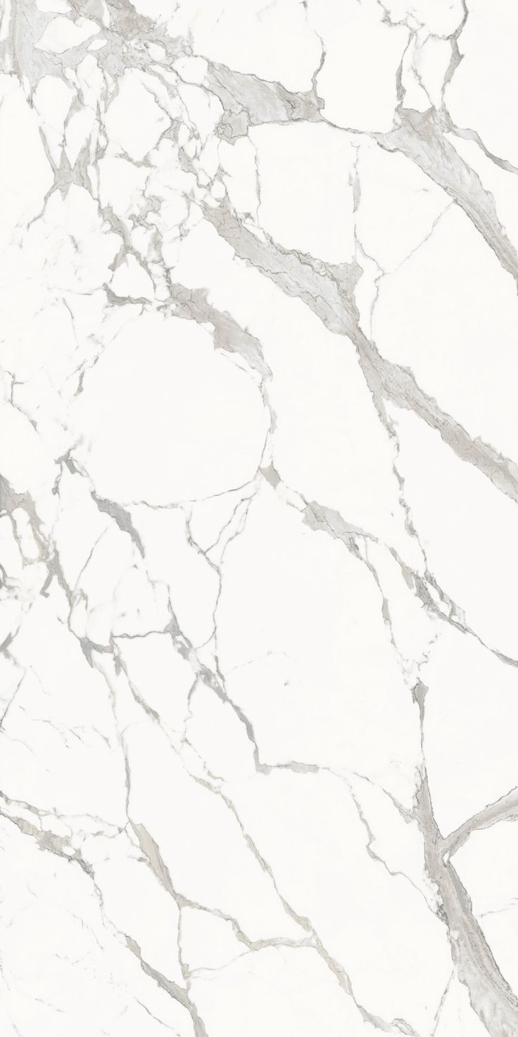 a white marble textured wallpaper with grey veiners on the top and bottom