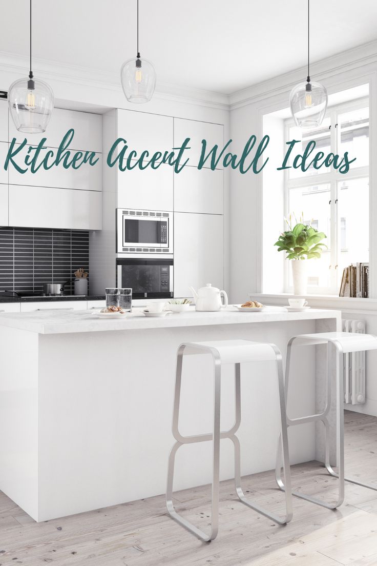 a kitchen with white cabinets and counter tops