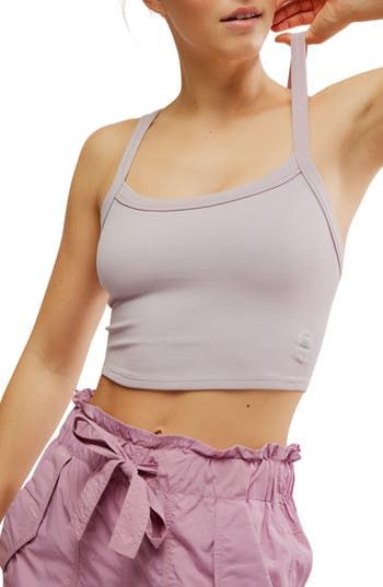 A cropped, racerback cut defines this rib camisole that's always ready for layering, lounging, lunging, lay-ups—you get the idea. 14" length (size Medium/Large) Scoop neck Racerback 87% polyamide, 13% elastane Dry clean or machine wash, dry flat By Free People; made in Turkey Spring Crop Top With Built-in Bra For Gym, Bra Friendly Racerback Crop Top For Loungewear, Spring Seamless Racerback Camisole, Versatile Crop Top With Tank Straps For Spring, Summer Activewear Tank Straps For Everyday, Tank Strap Activewear For Everyday Summer Use, Trendy Cropped Tank Top For Yoga, Seamless Summer Sports Bra For Everyday, Spring Racerback Crop Top, Bra-friendly