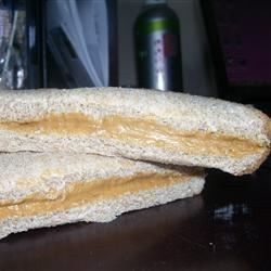 two sandwiches are stacked on top of each other