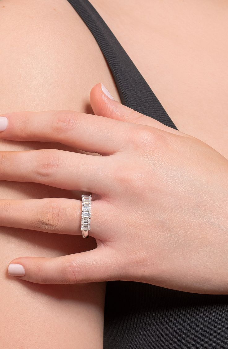 a woman's hand with a ring on it