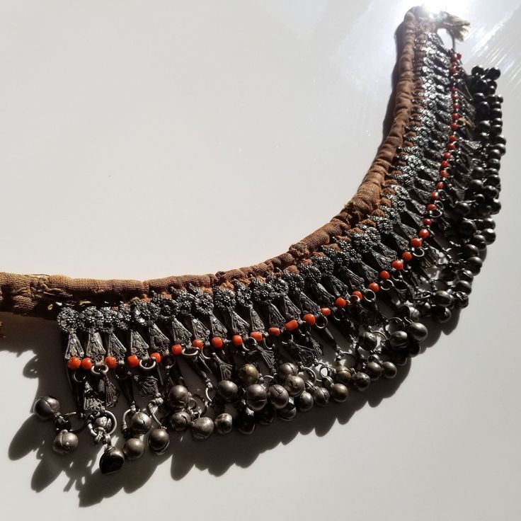 "A beautiful specimen for collector of tribal silver. This style is sometimes known as a labba mazamir and was popular with Jewish women living in Sa'ada. This piece is very old and in the original condition. Nothing has been restrung or replaced, nor has the silver been plated or dipped in a chemical acid bath for cleaning. The pendants exhibit very fine work in the filigrees with none of the shortcuts used in recent years. While you can wear it as a choker, and I've seen photos of this design Antique Silver Temple Necklace For Rituals, Bohemian Antique Silver Necklace For Ceremonial Occasions, Traditional Silver Metal Choker, Traditional Metal Necklace For Ceremonial Use, Traditional Metal Necklace For Ceremonial Occasions, Traditional Silver Pendant Choker, Traditional Silver Necklaces With Latkans, Traditional Heavy Silver Necklace, Traditional Pendant Choker For Festival