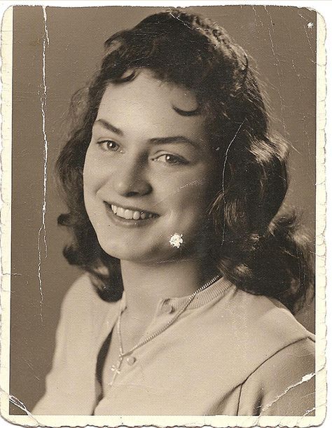 an old black and white photo of a woman