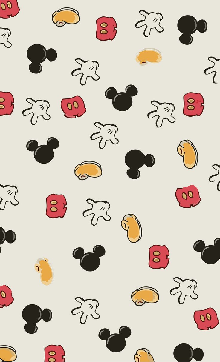 mickey mouse wallpaper with red, yellow and black ears on it's face