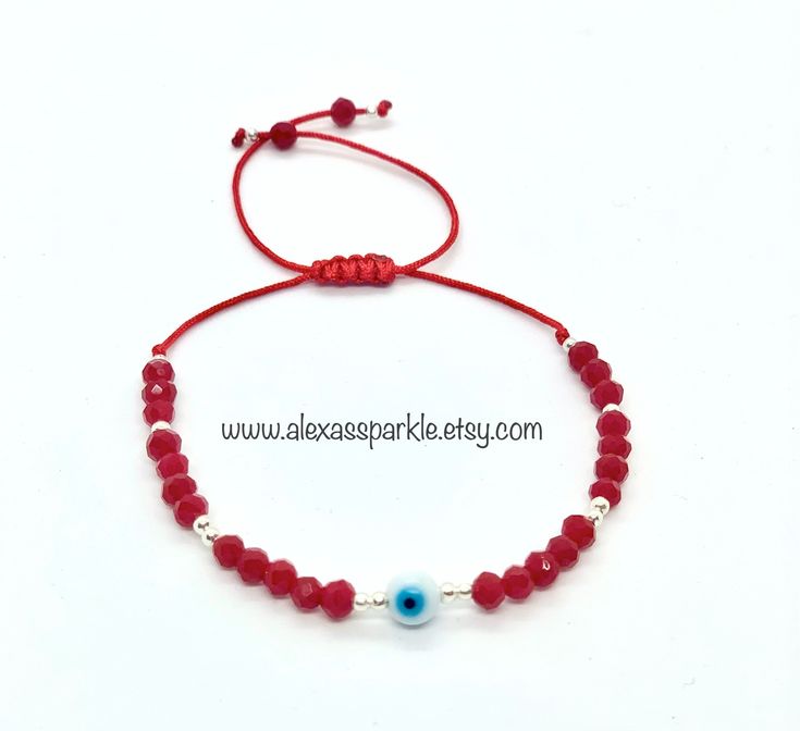 The post is for one individual bracelet. This beautifully handmade bracelet is made of 4mm red rondelle crystal beads, small silver colored beads, with a turkish glass eye bead that is 6mm. They are made with red nylon string and are adjustable to fit most wrists as it has a sliding knot to adjust. These are a great accessory for everyday wear. This bracelet is great for spiritual and evil eye purposes. It is believed that when a person wears or carries an evil eye with them, it guards against m Adjustable Red Hand-strung Crystal Bracelet, Handmade Red Rondelle Jewelry, Adjustable Sterling Silver Evil Eye Bracelet, Adjustable Sterling Silver Evil Eye Bracelet, Spiritual Style, Silver Beaded Evil Eye Bracelet For Gift, Silver Beaded Evil Eye Bracelet Gift, Adjustable Rondelle Crystal Bracelet With 8mm Beads, Spiritual Adjustable Sterling Silver Evil Eye Bracelet, Adjustable Red Sterling Silver Beaded Bracelets