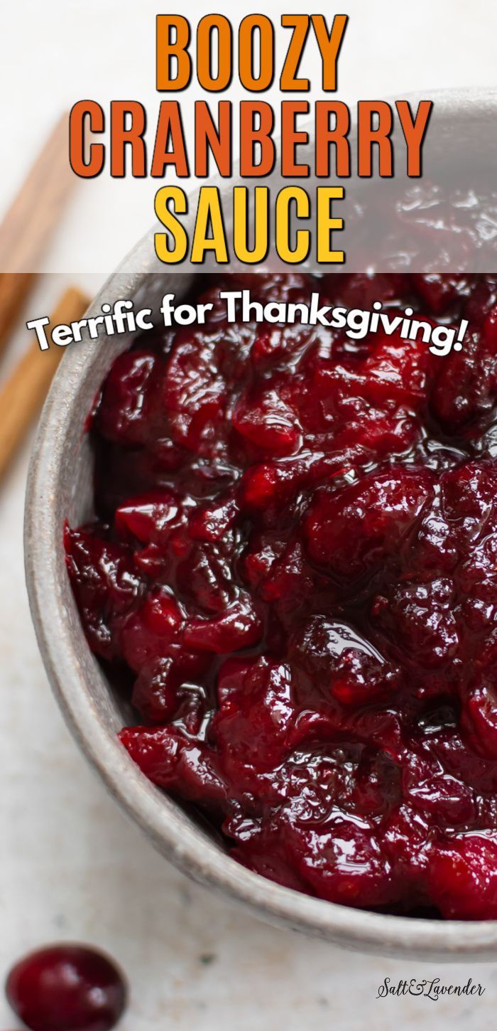 a bowl filled with cranberry sauce on top of a table