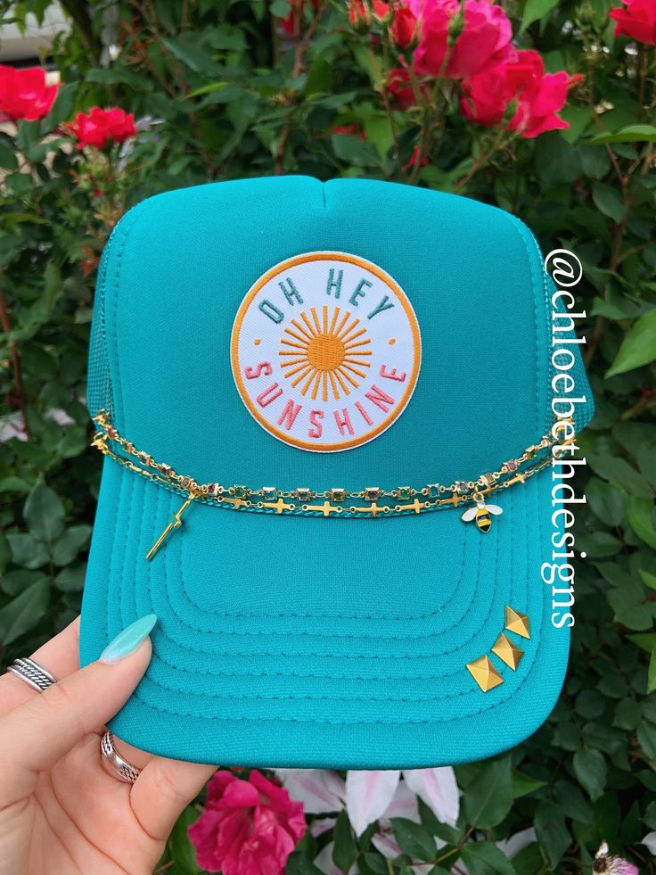 Hat chains are removable with clasps on each end. They can be bought separate or with the hat. Please allow up to 2 weeks for this hat to ship as this is a pre-order item.  $10-$12 chain options do not include hats.  $40-$50 bling hat options do include trucker hat and bling as pictured.  For clarification when purchasing: If you purchase one of the hat chain options, this is individual hat chains and does not include the trucker hat. If you purchase the bling hat option, this option includes th Summer Gold Trucker Hat, Adjustable Gold Trucker Hat For Summer, Gold Adjustable Trucker Hat For Summer, Gold Baseball Cap For Summer, Gold Adjustable Trucker Hat Trendy, Trendy Adjustable Gold Trucker Hat, Bohemian Summer Trucker Hat For Festival, Bohemian Trucker Hat For Summer Festivals, Bohemian Summer Festival Trucker Hat