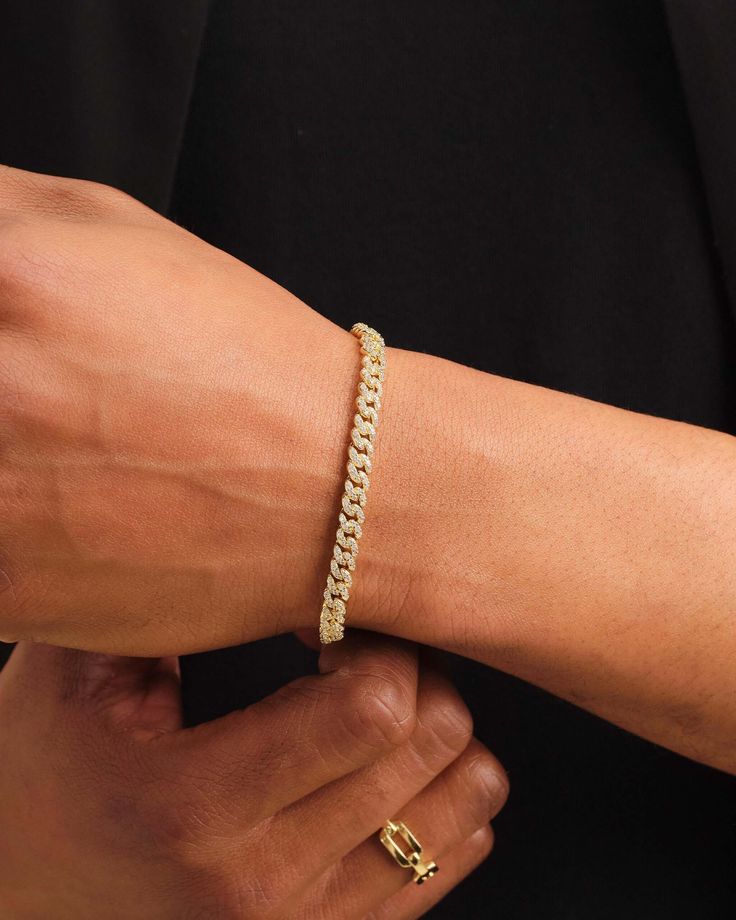 We've reimagined our men's Iced Out Cuban Set with a smaller, 5mm gauge for a refined and eye-catching look. This set is subtle enough to be your everyday chain and bracelet, but will complete your most luxurious outfit with those beautiful, handset pavé diamond simulants. Collect your set today and get 20% off. Classic Cuban Link Bracelets For Everyday, Classic Cuban Link Bracelet With Box Chain, Classic Cuban Link Bracelet For Everyday, Classic White Gold Cuban Link Bracelet For Everyday, Classic Everyday Cuban Link Bracelet In White Gold, Classic Cuban Link Chain Bracelet For Everyday, Classic Round Cuban Link Bracelet, Tarnish Resistant, Classic Round Cuban Link Bracelet Tarnish Resistant, Classic Round Cuban Link Tarnish Resistant Bracelet