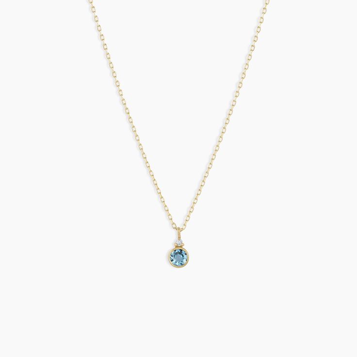 A modern heirloom. Introducing our take on a traditional style. Whether you wear yours or a loved one’s, a birthstone necklace is an easy way to add color and meaning to your look. This birthstone necklace features a 14k gold chain and diamond detail and makes for a perfect, personal gift. Blue Topaz is December's birthstone. Product Details Diamond: 0.01 total carat weight, 1.3 mm GH SI1-SI3 Blue Topaz: 0.15 total carat weight, 3 mm genuine blue topaz 14k solid gold 16" chain + 2" extender. Adj Color And Meaning, Gold Birthstone Necklace, Topaz Birthstone, December Birthstone, Birthstone Necklace, Traditional Style, Blue Topaz, Gold Chain, Gold Chains