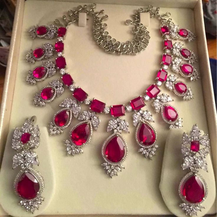 Indian Bridal Necklace And Earrings Elegant Red Bridal Necklace For Party, Red Hand Set Bridal Necklace For Party, Luxury Red Jewelry For Festive Occasion, Luxury Red Festive Jewelry, Formal Red Bridal Necklace With 17 Jewels, Luxury Red Bridal Necklace For Celebration, Elegant Red Jewelry Sets With Matching Earrings, Luxury Red Bridal Necklace For Gift, Elegant Red Jewelry Sets For Formal Occasions