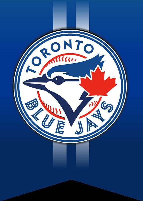 the toronto blue jays logo is displayed on a wall in front of a striped background