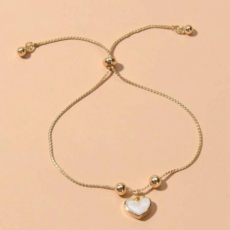 Heart Charm Bracelet Yellow Gold Gold Casual Jewelry For Valentine's Day, Casual Gold Jewelry For Valentine's Day, Casual Heart Charm Bracelet For Everyday Wear, Gold Heart-shaped Casual Bracelet, Gold Casual Bracelets For Valentine's Day, Casual Heart Charm Bracelet, Casual Gold Bracelets For Valentine's Day, Casual Everyday Heart Bracelet For Valentine's Day, Casual Gold Heart-shaped Jewelry