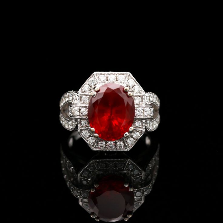 Luxury Open Ruby Ring With Diamonds, Red Center Stone Platinum Ring, Gia Certified Emerald Cut Ruby Ring In White Gold, Red Platinum Ring With Center Stone, Formal Gia Certified Lab-created Ruby Ring, Classic Red Diamond Ring In Platinum, Classic Red Diamond Platinum Ring, Red Oval Diamond Ring In Platinum, Formal Ruby Ring With Platinum Center Stone